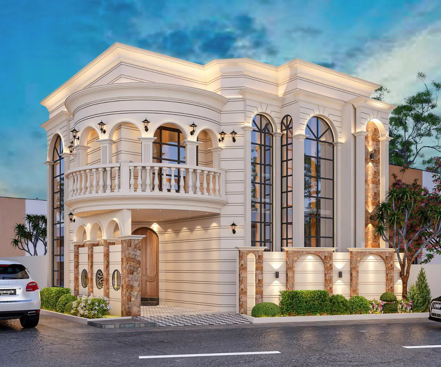 Classical double-storey house design with arched windows and balcony, typical of Bahria Town Lahore