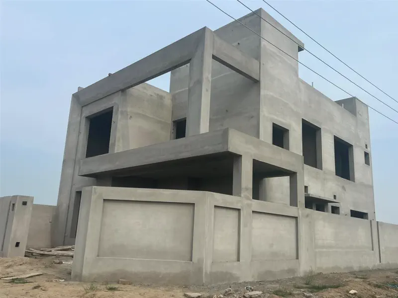 Grey structure shell construction by Planet Builders
